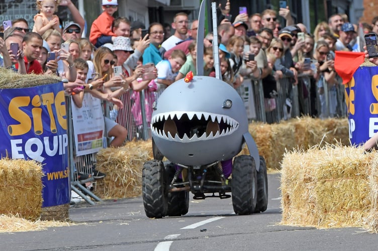 BORDON SOAPBOX

BORDON, HAMPSHIRE
ENGLAND
23rd JULY 2023

On Sunday 23rd July 2023 Whitehill & Bordon in Hampshire was transformed into the ultimate community driven soapbox spectacle, the official Bordon Soapbox Derby

With the main road through the town closed to  traffic the hundreds of spectators were able to walk around the attractions that had been put in place in the early hours of Sunday before gathering many deep on Chalet Hill to watch the 'soapbox racers' take on the challenge to be the fastest competitor to get to the Finish Line ! 

Some of the racers were quick, some were slow, and some driver's after having spectacular spills were permitted to run to the Finish Line as long as they were carrying 'any part of their soapbox' ! 




(Photo by Malcolm Wells)
 
Standard reproduction rates apply, contact Malcolm Wells to arrange payment - Mobile: 07802-217-569 
malcolmrichardwells@gmail.com
