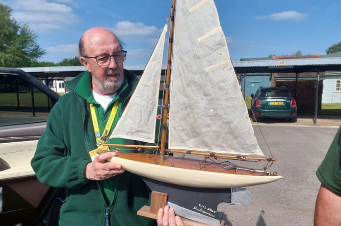 The German POW-built model yacht with its repairer, a contact of Farnham Repair Cafe