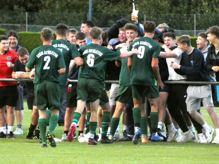 Liss Athletic players celebrate with their fans at Liphook United