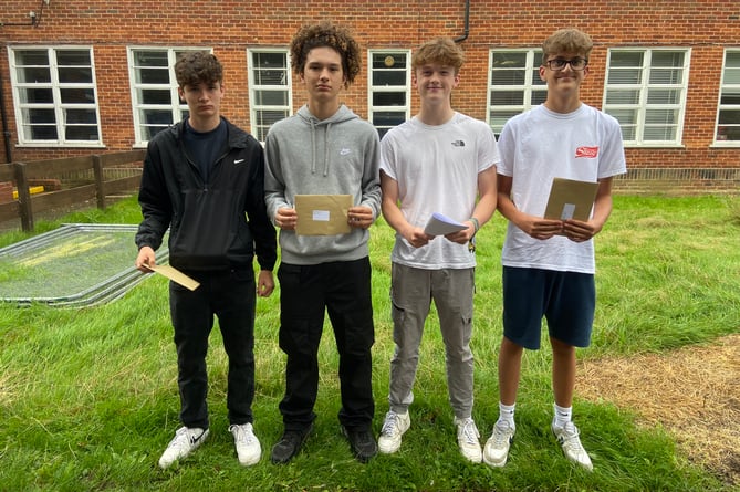 From left: Griff Pretsell, Theo Pinyoun, Tom Boyd and Joshie Pearce collect their GCSE results from Amery Hill School in Alton on August 24th 2023.