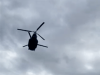 Watch the incredible moment a Chinook flies just metres over golfers