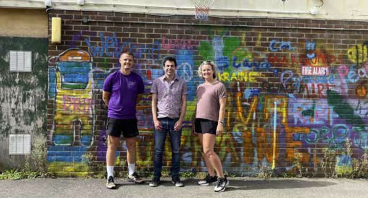 Cllr Andy Tree, centre, at Project 94 in Bordon.