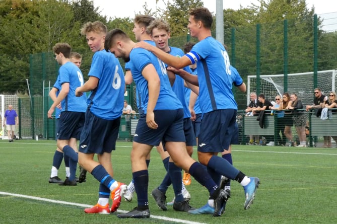 Liss Athletic celebrate their goal at Harvest