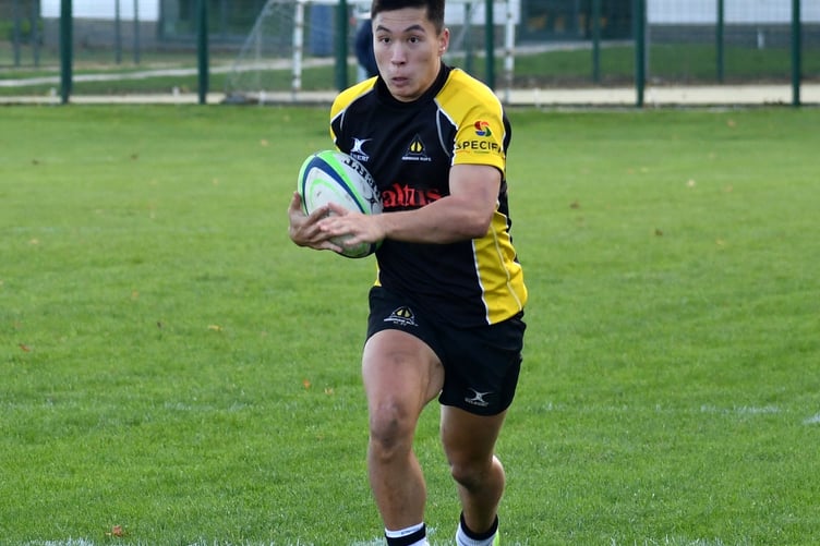 All eyes on the try line for Toby Simmonds on his way to scoring a try