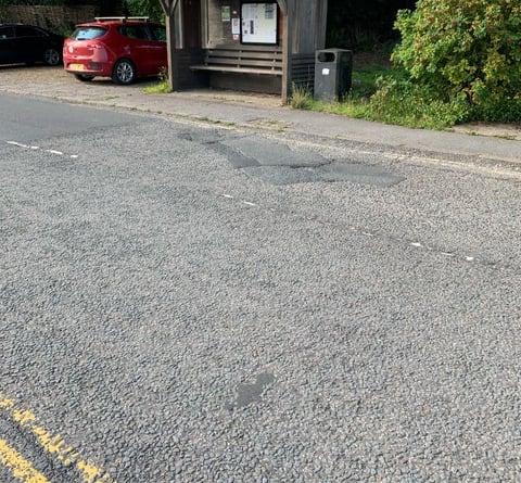 The badly repaired road where a 97-year-old tripped and badly injured herself in Grayswood