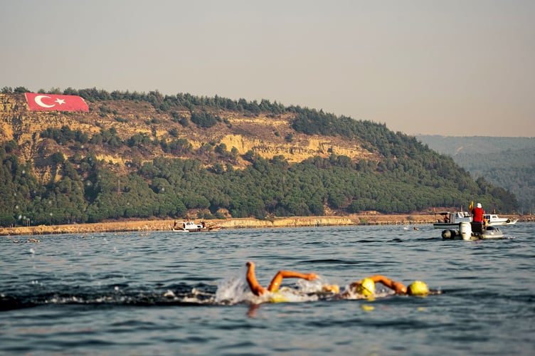 The Brancaster Bathers had to swim across one of the world’s busiest shipping lanes to complete their challenge