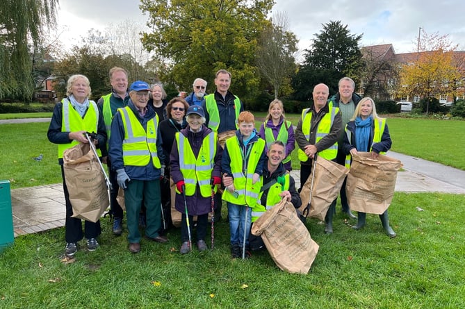 Chancellor Jeremy Hunt (centre) with Farnham and Bordon candidate Greg Stafford (second from left) and fellow litter pickers