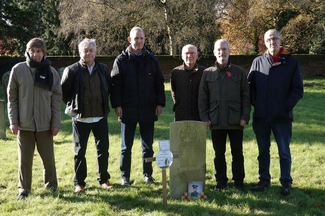 The Farnham Great War Group at the grave of Private Joseph Parsons in West Street on Armistice Day                               