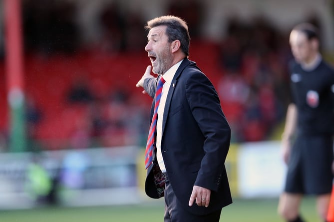 Aldershot Town manager Tommy Widdrington is looking forward to Sunday's FA Cup tie against Stockport County