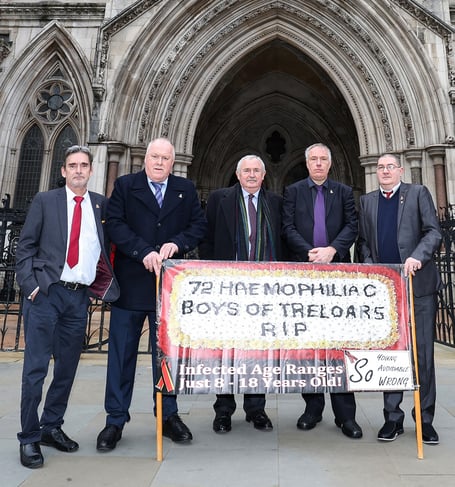 Treloar’s infected blood victims with Des Collins of Collins Solicitors at the High Court in January 2022.
