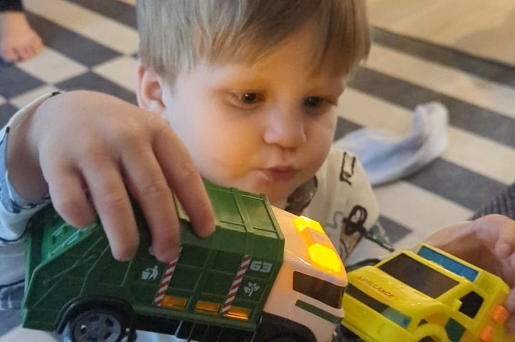 Ralf playing with his favourite toys