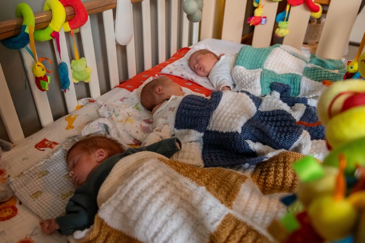 (L-R) Emil, Ava and Alba. Chris Wise and Hannah Gurney with triplets, Emil, Ava and Alba at their home in Portsmouth, December 19 2023. Release date â December 20, 2023. See SWNS story SWSMtriplets. Meet the miracle triplets who arrived home in time for Christmas - after arriving eight weeks early and spending five weeks in hospital. Little Emil, Ava, and Alba Wise, now six weeks, were able to finally leave the Queen Alexandra Hospital, Portsmouth after arriving at 32 weeks on November 1. Their proud parents Hannah Gurney, 36, and her partner, Chris Wise, 38, a sports broadcaster, had planned to have a c-section at 34 weeks but Hannah went into labour a fortnight early. Ten hours later, they welcomed Emil, Ava, and Alba - weighing 3lbs 3oz, 3lbs 2oz and 3lbs 1.5oz respectively. After spending five weeks in intensive care gaining strength and growing, the babies were discharged on December 5, 2023. Hannah and Chris have now brought the triplets home and are ready to spend a quiet Christmas as a family of five.