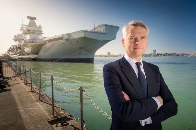 Charles Woodburn, Chief Executive Officer of BAE Systems pictured for the Sunday Times at the Royal Navy Base in Portsmouth with the new aircraft carrier HMS Prince of Wales
Picture date: Friday February 26, 2021
Photograph by Christopher Ison Â©.07544044177.chris@christopherison.com.www.christopherison.com
IMPORTANT NOTE REGARDING IMAGE LICENCING FOR THIS PHOTOGRAPH: This image is supplied to the client under the terms previously agree. No sales are permitted unless expressly agreed in writing by the photographer.