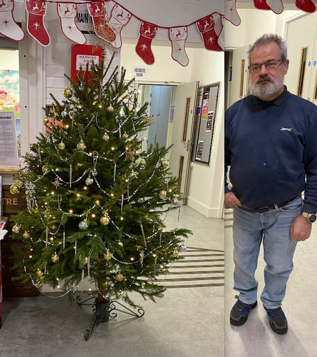 Robert and the Christmas tree he obtained for Alton Community Centre.