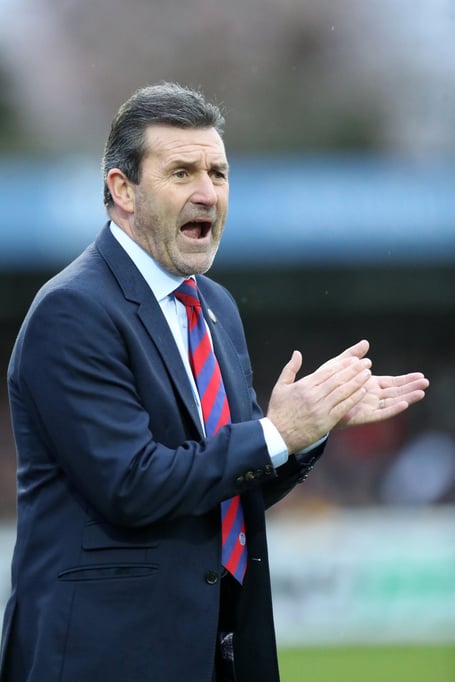 Aldershot Town manager Tommy Widdrington