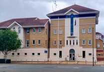 Surrey Police detention officer dismissed after assaulting prisoner