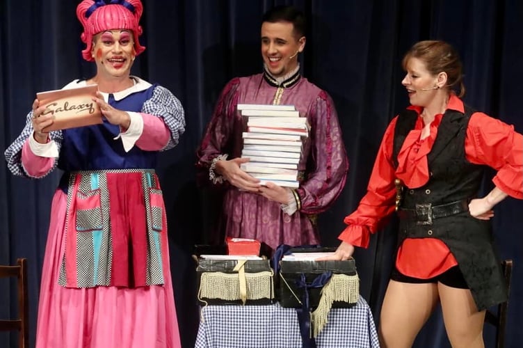 Haslemere Hall manager Howard Bicknell (left) takes the role of panto dame Gertie in Haslemere Thespians' production of Once Upon a Time