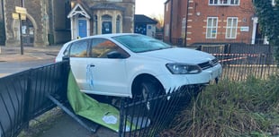 VIDEO: Car crashes into Farnham town centre barriers after hitting ice