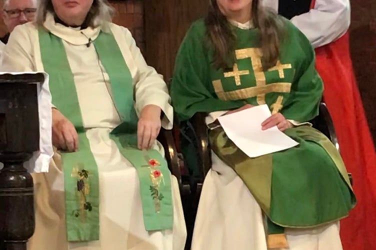 Alan and Lesley Crawley with Bishop Paul (standing)