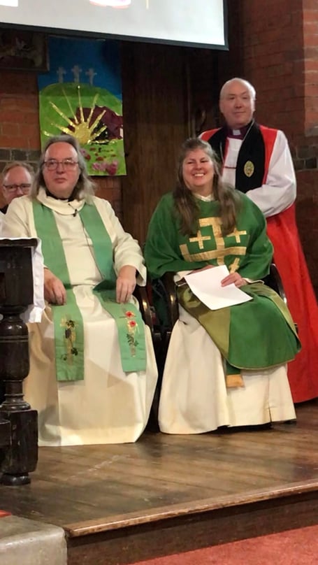 Alan and Lesley Crawley with Bishop Paul (standing)
