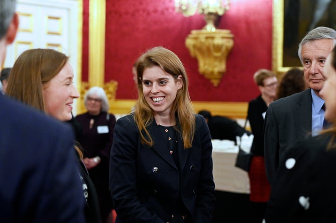 Princess Beatrice chats with supporters of Helen Arkell Dyslexia Charity at St James' Palace in London