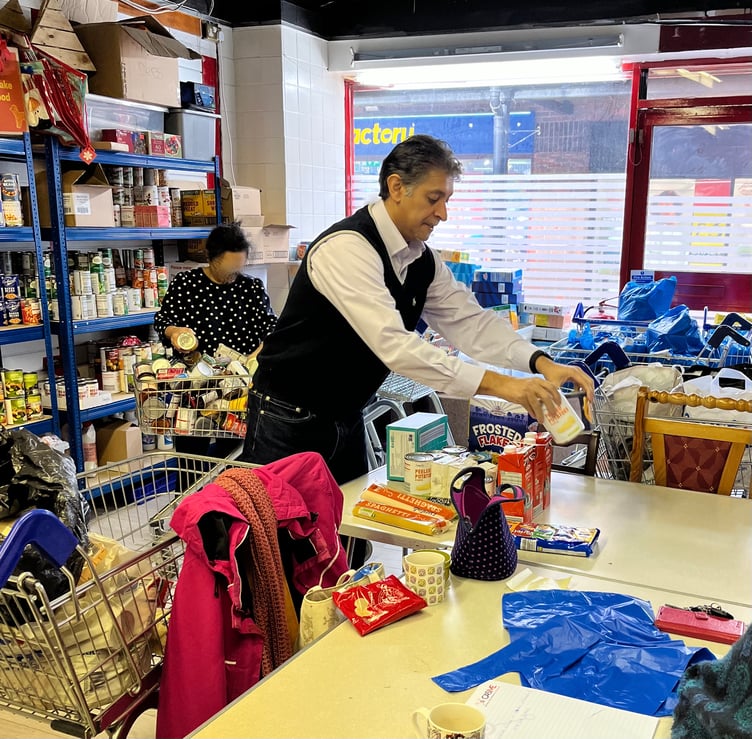Lib Dem candidate for Farnham and Bordon, Khalil Yousuf, helping out at Bordon Foodbank