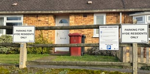 Residents rally against controversial village parking permit scheme