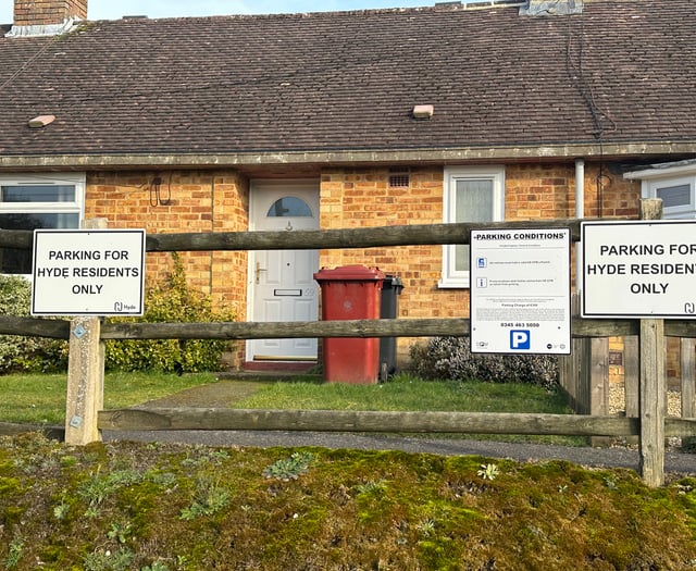Residents rally against controversial village parking permit scheme