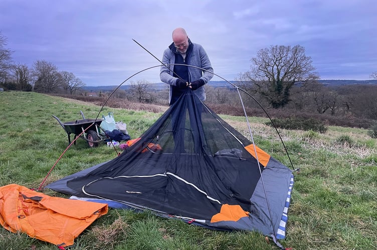 Andrew setting up his tent for night two. 
