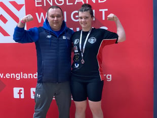 Rising weightlifting star wins silver thanks to community support