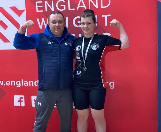 Rising weightlifting star wins silver thanks to community support