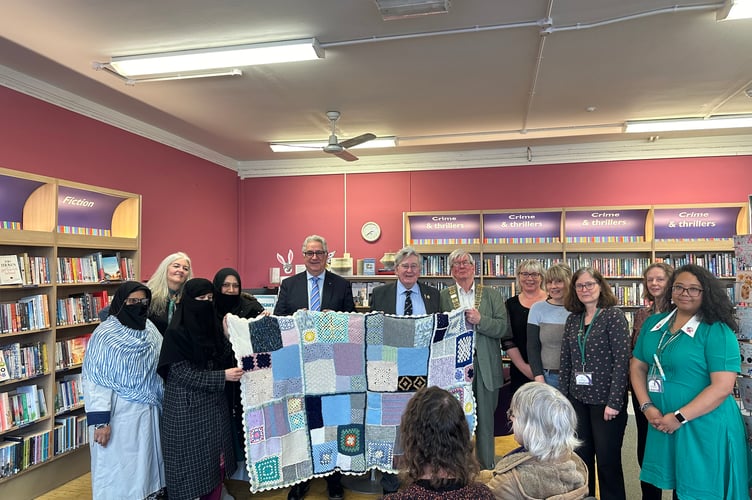 A selection of the community who helped knit four blankets