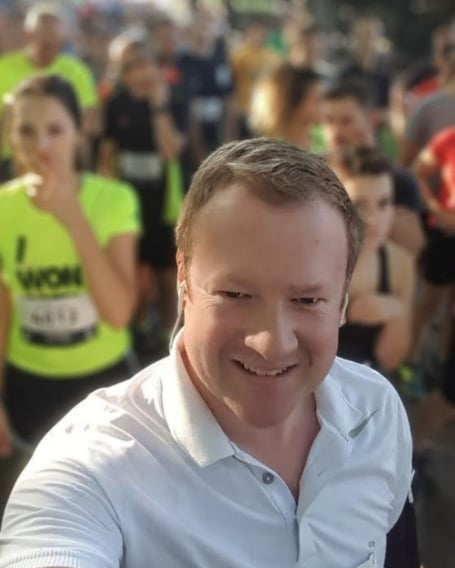 Gregory Stafford with marathon runners.