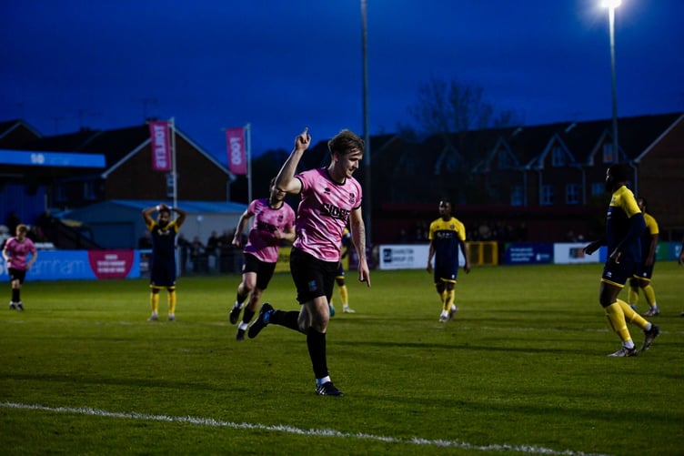 Owen Dean celebrates after giving Farnham Town the lead against AFC Croydon Athleitic