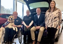Dealership welcomes driving force behind East Hampshire canine charity