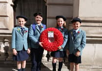 Haslemere school pupils lay wreath at the Cenotaph on St George's Day