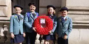 Haslemere school pupils lay wreath at the Cenotaph on St George's Day