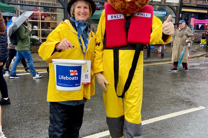 RNLI mascot Stormy Stan with a fellow volunteer (Michelle Monaghan)