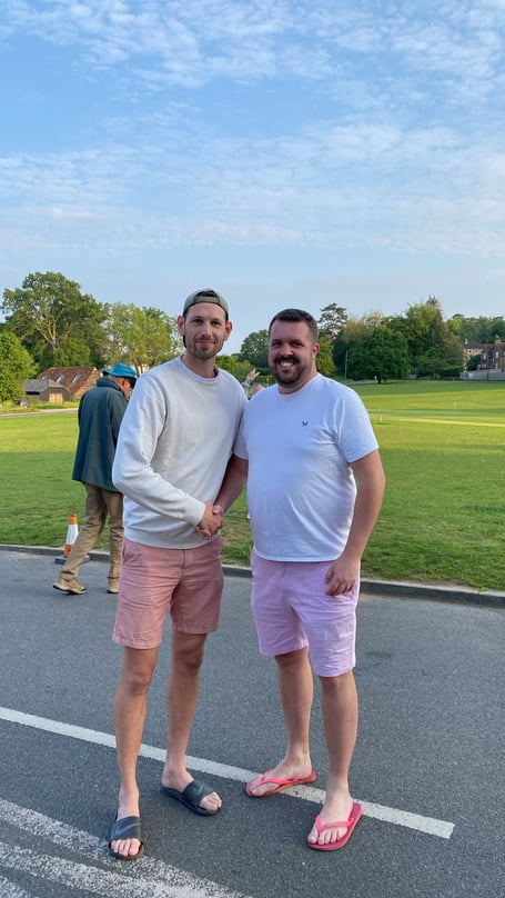 Tilford skipper George Ellis (left) congratulates Tilford player of the match Ben Matthews