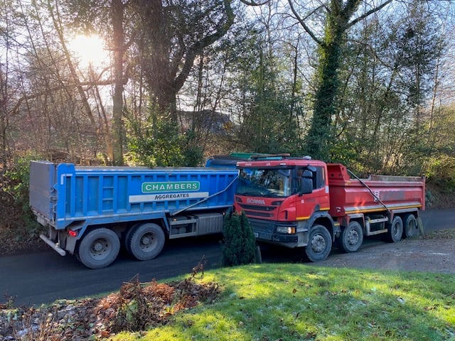 Heavy-duty lorries struggle to pass each other on Scotland Lane