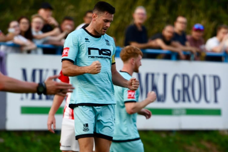 Ryan Kinnane celebrates after scoring Farnham's equaliser against Bracknell Town