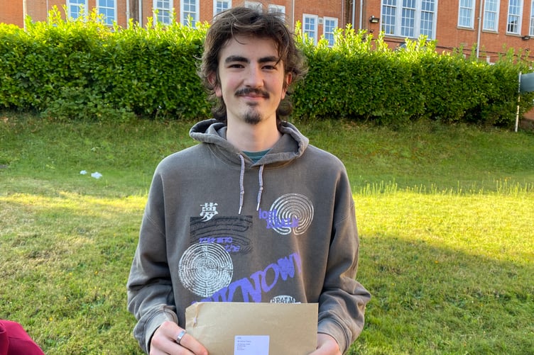Arthur receiving his A-Level results at Farnham College