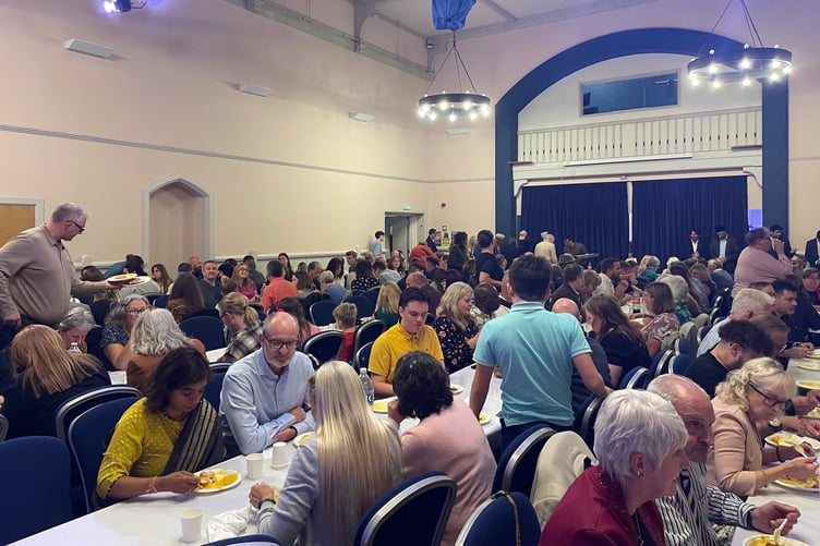 Alton residents share meals together in solidarity and unity