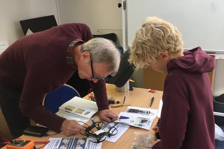 Ruben Attfield & Eric Willner fixing a drone