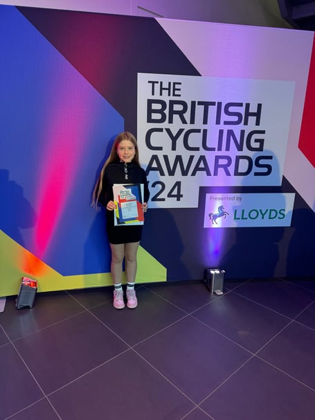 Four Marks BMX rider Betty Wills with her British Cycling award