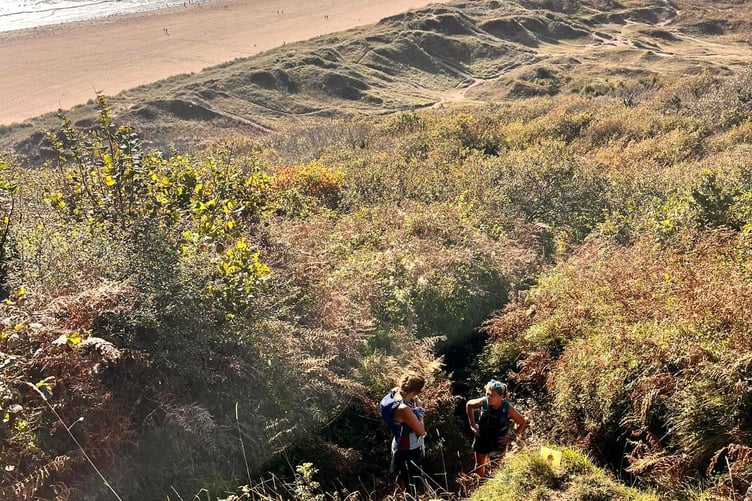Billie McCulloch and Kate Townsend tackle a steep section at Oxwich