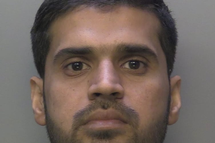 Faisal Malik custody photo