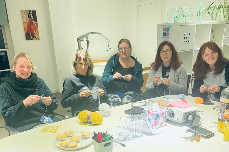 Caption: Caregivers from Right at Home unwinding at their new Crochet Club.