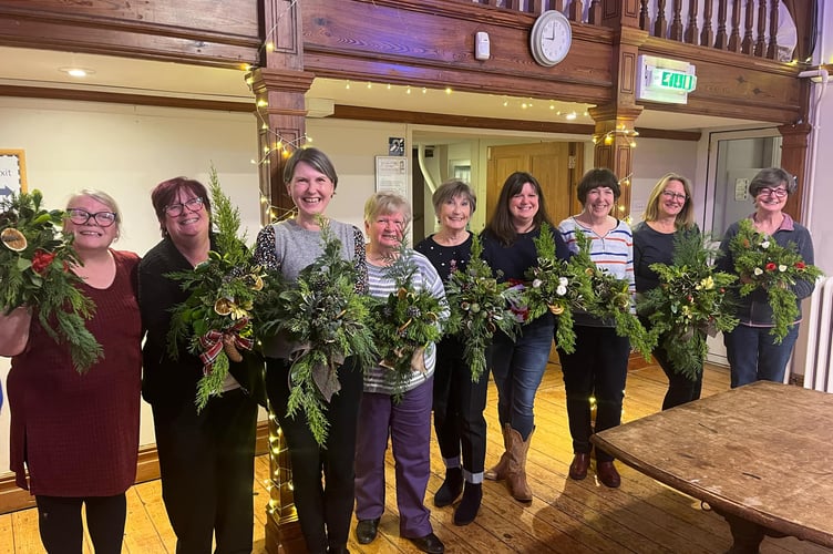 Workshop participants show off their creations