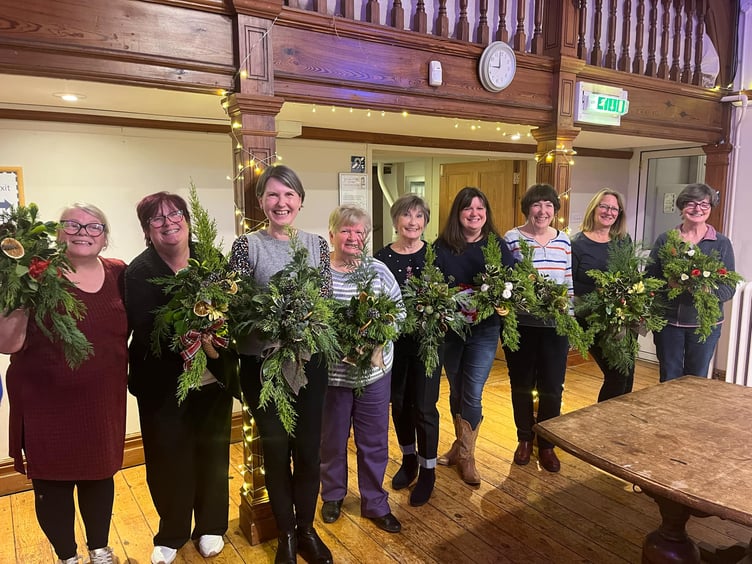 Workshop participants show off their creations